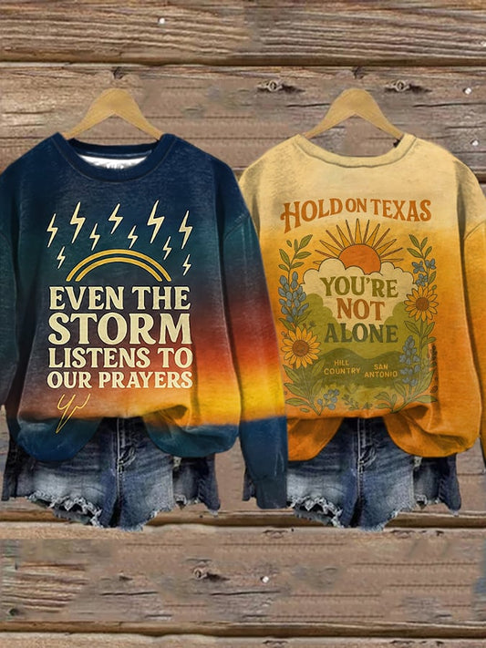 🙏💔Join us in praying for Texas.🙏Retro Texas Strong Even The Storm Listens To Our Prayers Hold On Texas You’Re Not Alone Hill Country San Antonio Hope Strength Print Sweatshirt